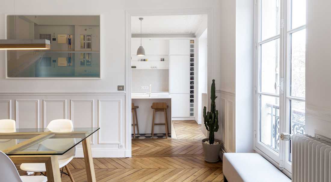 Aménagement d'un cuisine ouverte dans un salon par un architecte à Lille