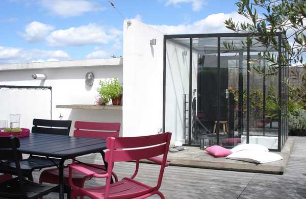 Transformation d'un toit en terrasse végétalisée style Loft par un architece paysagiste à Lille