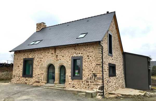 Extension d'une ancienne maison en pierre dans les Hauts-de-France